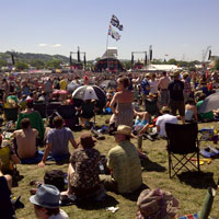 Festival Essentials List and Festival Camping Checklist - Glastonbury Festival Pyramid Stage in the sun