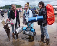 The Festival Survival Guide - Glastonbury Festival the girls with their gear