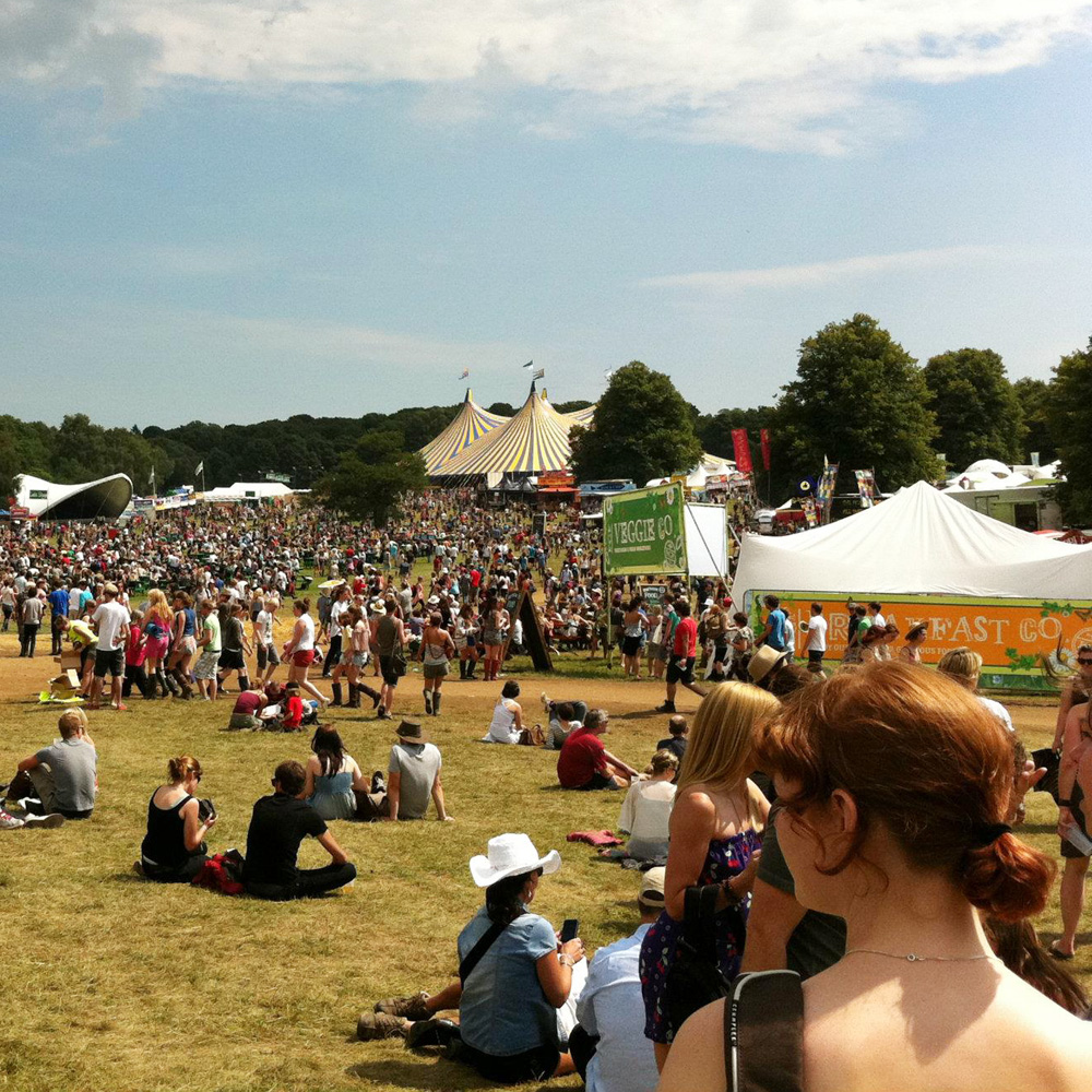 How to survive hot and wet festivals - a guide to extreme festival weather - summer festival arena stages and stalls