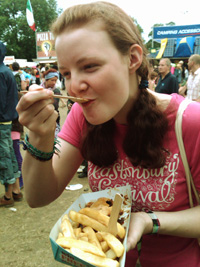 Festival Food - The Festival Eating and Festival Cooking Guide - Ami eating pie in the Glastonbury Festival markets